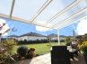 Toit terrasse adossé avec toit polycarbonate