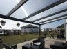 Toit terrasse adossé avec toit polycarbonate