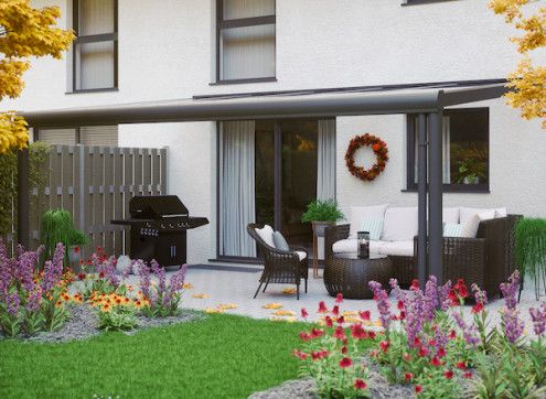 Toit terrasse adossé avec toit polycarbonate