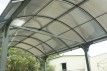 CARPORT ALUMINIUM TOIT CINTRÉ EN POLYCARBONATE