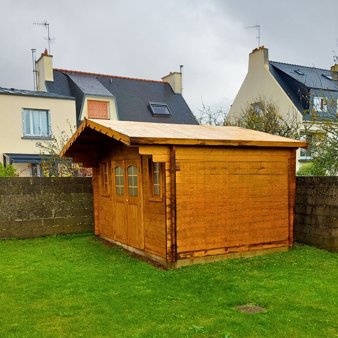 abri de jardin avec feutre bitumé arraché